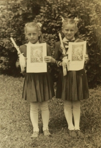 At Holy Communion with her sister Hana in the mid-1950s
