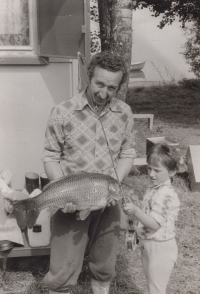 Fr. Drápala with his son Daniel and his catch, 1980s