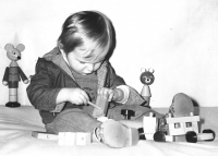 Younger son Janouch with toys

