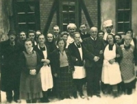 Charlotte Scharf's mother, Mrs. Brückner (third from bottom left); the film shows employees of a restaurant in Jablonec nad Nisou, where she worked after the war