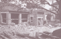 Building of Vladimír Hůla's printing house in today's Školní Street in Humpolec. The photo also shows little Miroslav with his brother and mother, 1930s
