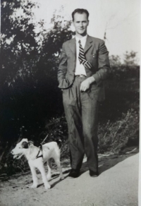 Her dad with his dog Lumpík in 1937