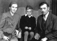 With his mother and father, ca. 1943