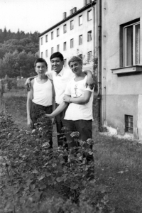 Witness on the left with a Japanese man and a friend, Litvínov, 1968