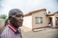Mr Nepolo in front of his house in Ongwediva