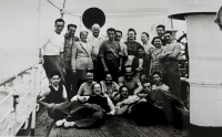 21 young Czechs on a ship from Hamburg to Ecuador. Hana´s first husband with glasses standing right, Hana sitting in the middle with Victor near her, 1938