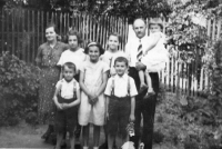 Husband and wife Burget together with their children in the garden in Kroměříž, 1936
