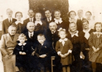 M.Mráčková with all of her family (the girl with a bow)