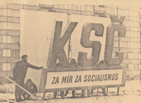 Tearing down a Communist Party banner in Veselí nad Moravou, November 1989