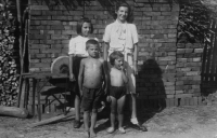 Marie (on the right in the upper row) with her siblings Františka (1939 - 2006) and Josef (1942)  and Antonie (1944) in the bottom row, Tlumačov 1949