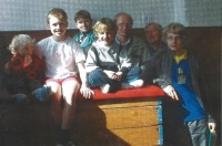 Milan Geryk (right) next to his son-in-law Hynek Poljak and his five sons, right to left: Marian, Lucian on the vaulting box, Patrik in the back, Darian, Kristian - all Sokol members; Sokol gym in Přerov, 2013
