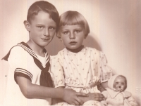 Věra Domincová with her brother Lubor and doll Karlíček, about 1938
