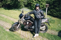 Erna Machová with a motorbike. 2007