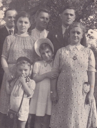 On the left parents Božena and Antonín, on the right grandfather Hugo Kuželka, on the bottom left Věra with her brother Rudolf, 1940s