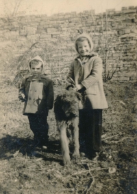 Jiří Nachtigall as a child in the 1940s on the family farm, with sister