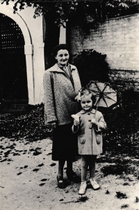 Eva as a little girl with mum during a church fair in Dýšiná, 1955 