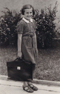 Věra Pěničková on her way to school, 1940s