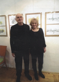 With her husband at an exhibition of his paintings, 2014
