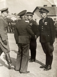 The witness's father (on the right) after the war in 1945