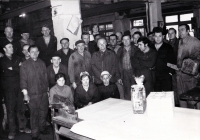 Marie Voznicová (sitting on the right in a helmet) with other machine lubrication workers and a team of locksmiths of the ČSA Coking Plant in Karviná / 1970s
