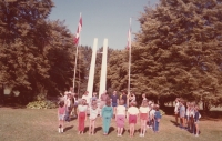 Czech and Slovak children in exile raising the flag at the Masaryktown camp in Toronto, circa 1985