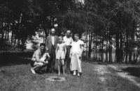 With her father, Karel Bock, and grandparents, 1938