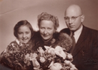 With mother Marie Böhmová and new father František Klein, 1946