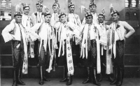 Father Antonín Bartoš Sr (bottom row, third from left) and his brother Josef Bartoš (top row, far right) during a folkloric feast, early 1930s