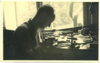 Father Ferdinand Morávek at work in the jewellery shop, circa 1965