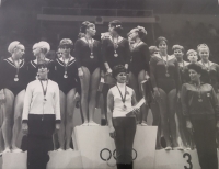 Bohumila Rešátková (third from left) on the podium at the 1968 Olympic Games in Mexico City. Věra Čáslavská is on the far left, her coach Slávka Matlochová is in front