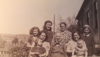 Třebíč family, above from left: Věra, Růženka, aunt Máňa, her sister Milka. Bottom row: mother, Věra´s sister, grandmother Kratochvílova, aunt Anča with Vláďa