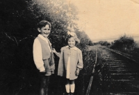 Karolina Remiášová with brother Alfred on a railway bridge that was blasted off in 1953