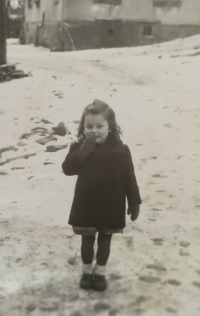 Karolina Remiášová as a little girl in the winter; she loved and still loves joyous winter times