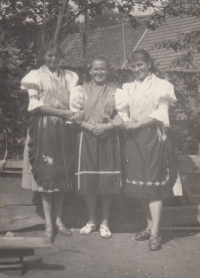 Magdalena Hojková in folk dress (first from left), Slovakia, 1961