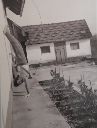 The house in Semice, a view on the summer house where they cooked in summer and Ladislav awaited the birth of his daughter there. Ladislav´s daughter (or wife) is in the photo 