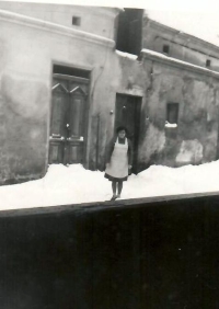 Miloslava Zímová´s mother in the yard of the Hercl family farm in Lhota