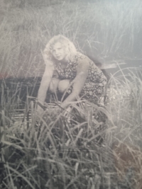 Mother Natasha washing clothes in the river, second half of the 1970s