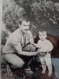 Father Svinolupov with little Oksana, 1981