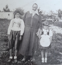 With grandmother Nováková and his sister Anna