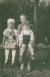 With her mother and brother, around 1935