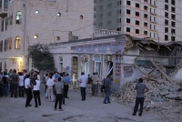 Demolice sídla Institutu pro mír a demokracii, 11. srpna 2011