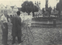 Witness' great-uncle, painter František Mořic Nágl working in the Telč's main square. His last photo before he was transported to Theresienstadt

