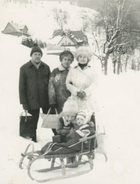Miroslav Chromý with his family in the mountains in winter