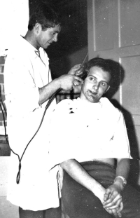 Jaroslav Novák in 1967 at a barber getting his hair cut into a military cut, required before enlisting in the barracks of the Czechoslovak People's Army