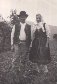 Anežka Holbová with her father in the traditinal costume