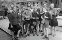 Milan ůžička (in black T-shirt in the middle) with classmates on a school trip / 1946