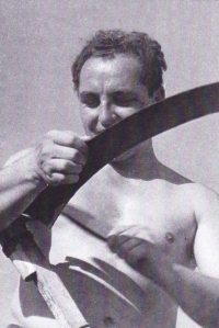 Štefan Králik learns to work with a scythe, late 1940s..