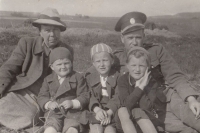 With parents and sisters in Spálené Poříčí, war years
