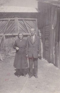 Radomil's parents, Františka and Karel Lhotka in the yard of their house in Zahrádka