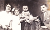 Eva Králiková as a child with her sister and godparents, late 1930s.
